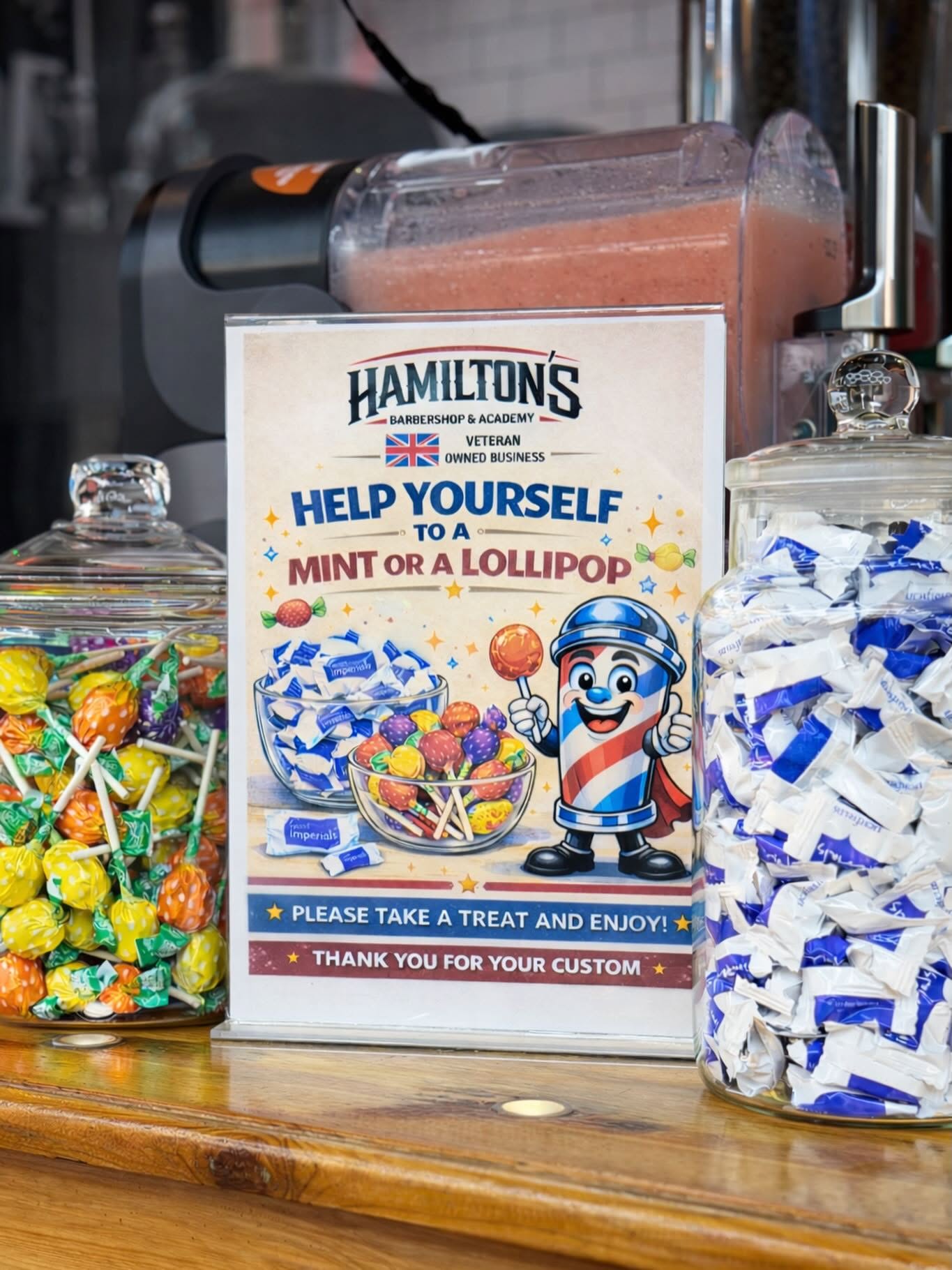 Hamilton's barbershop sign offering free treats