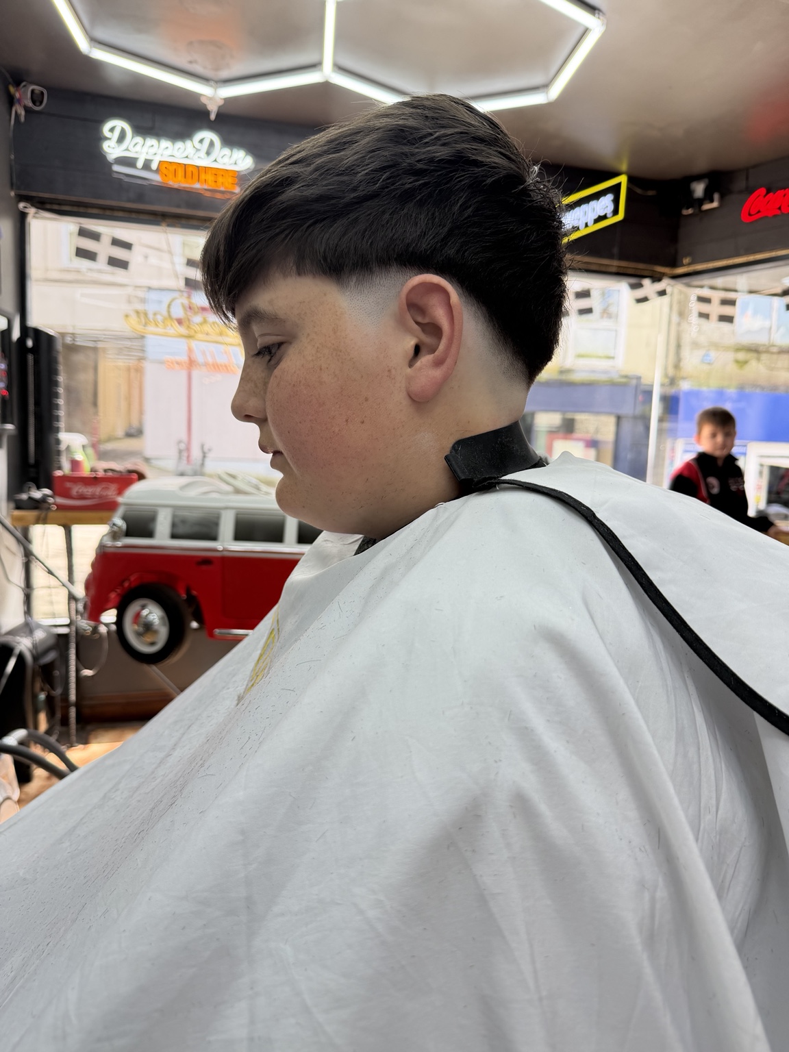 Child's crop haircut with a fade