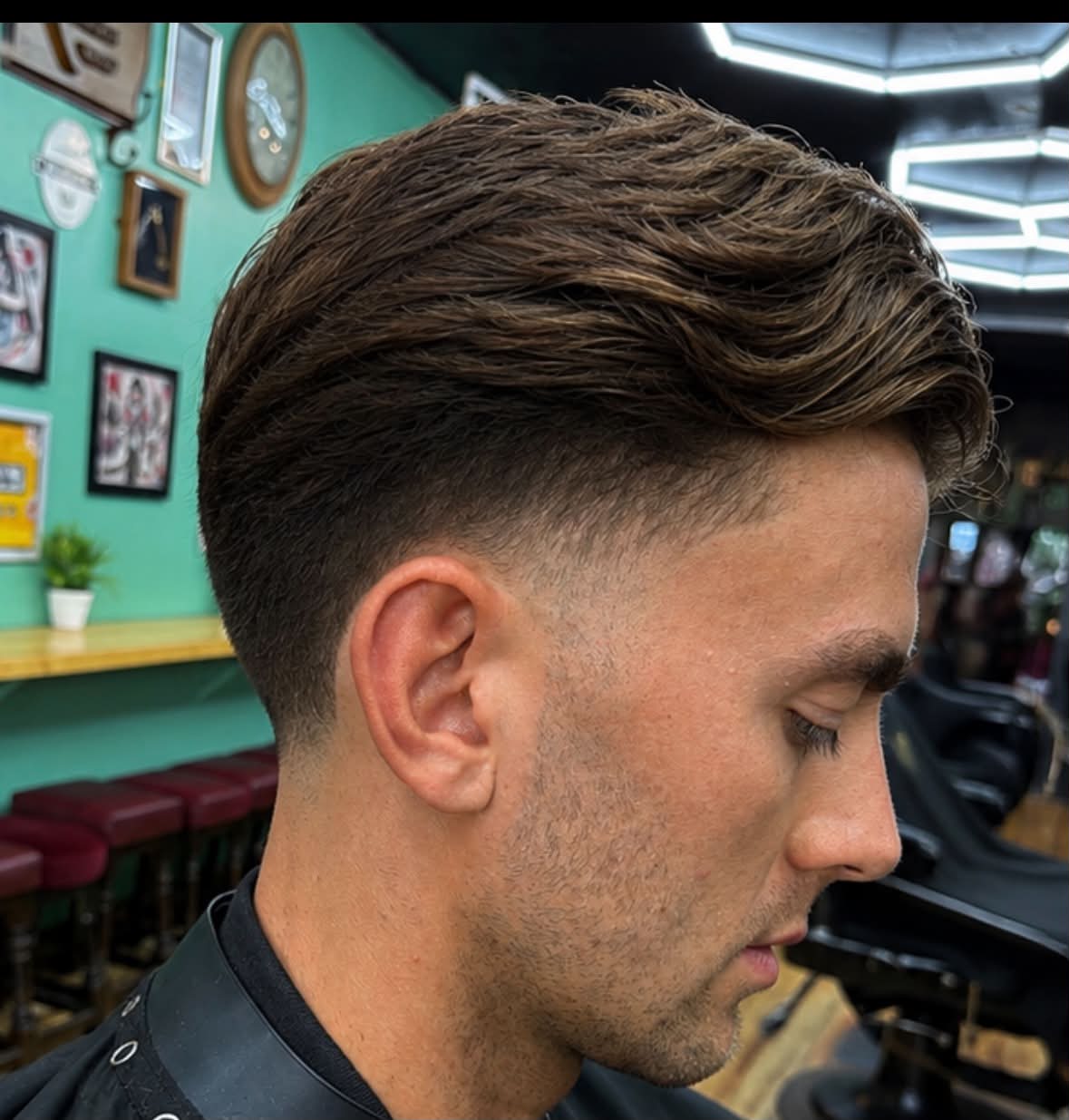 Textured quiff with a clean fade