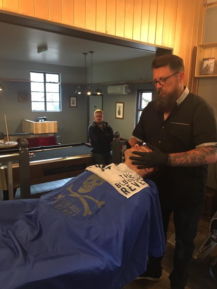 A shave demonstration at an off-site stand