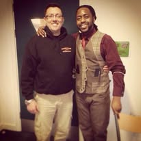 Two barbering professionals meeting at an industry event