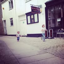 Children outside the original Hamilton's courtyard shop