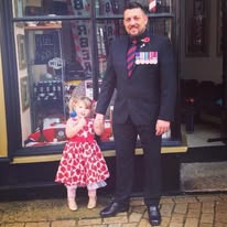A family moment outside an early Hamilton's shop