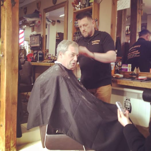 Nigel Farage having his hair cut at Hamilton's Barbershop in Redruth on 6 March 2015